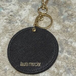 Laura Mercier Black Keychain Mirror Accessory gold accents elegant chic purse